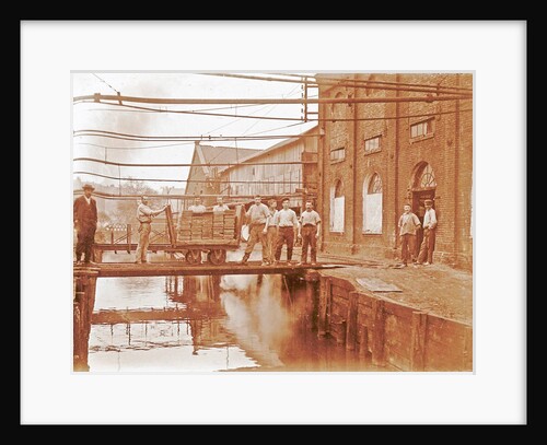 Workers in the back with a loaded cart at a pond by Anonymous