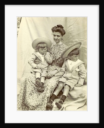 Portrait of a woman with two children with sun hats and sailor suits by Anonymous