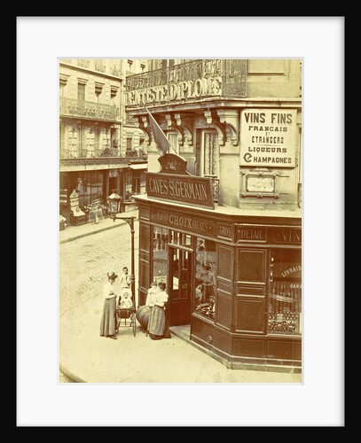 Two women and three children standing at the entrance of wine trade Caves St. Germain by Anonymous