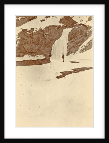 Man on the frozen waterfall Dota, Tibet by D.T. Dalton