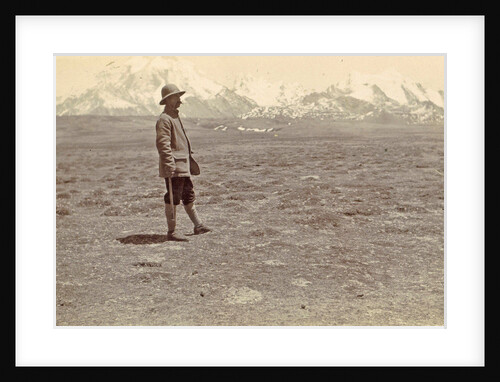 Man on a plain with a backdrop of Mount Chumahlari (7315 m), Mount Chomolhari in Bhutan by D.T. Dalton