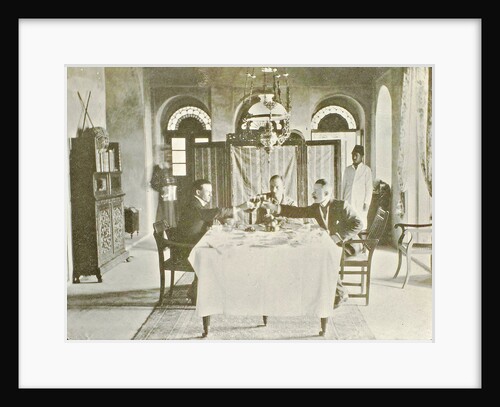 Group portrait in an interior of F.W. Emmerson, H. C. van der Zee, H. Pouderoyen in Buchire by Anonymous