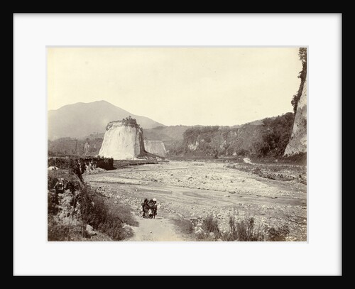 Indian women and children in a dry riverbed in an eroded landscape, possibly in Sumatra, Indonesia by Anonymous