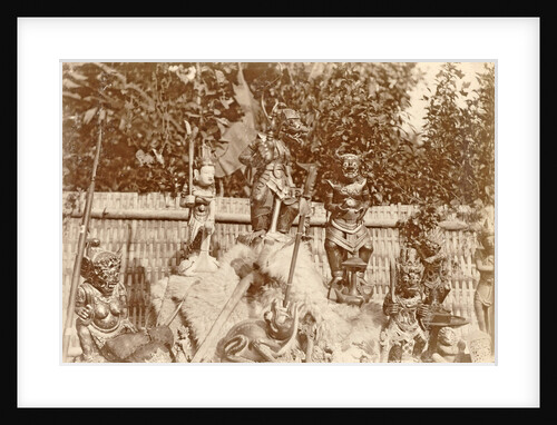 Group of wooden sculptures in the open air in the Dutch East Indies, Indonesia by Anonymous