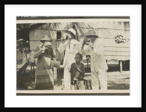 Two men in tropical clothing and a woman drinking from bowls, leading a boy by Anonymous