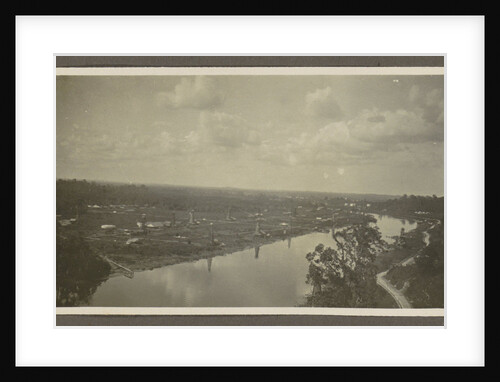 Panorama of a river, drilling rigs, storage tanks and buildings by Anonymous