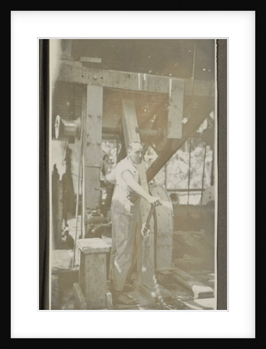 Man operating a machine with a lever by Anonymous