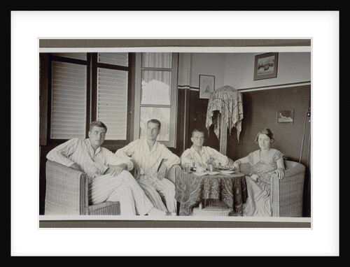 Three men and a woman around a table by Anonymous