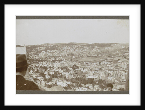 View of a city with white buildings by Anonymous