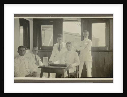 Five men in tropical attire sitting around a table by Anonymous