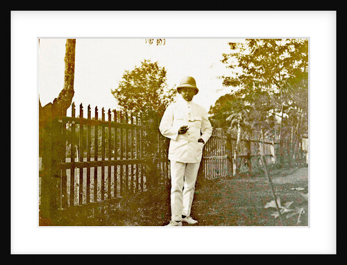 Sumatra indonesia, John Lanting at fence by Anonymous