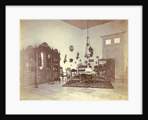 Portrait of a woman in a living room with colonial décor in Indonesia by Anonymous