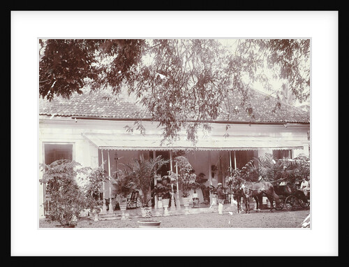 Portrait of a young couple in a car driven by servants in the Dutch East Indies, indonesia by Anonymous