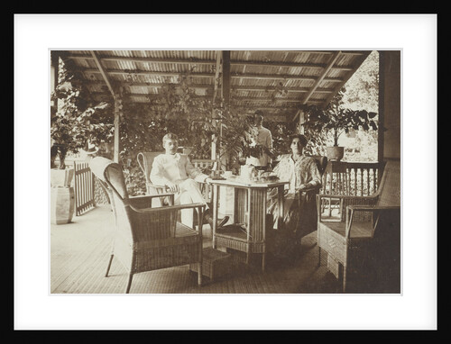 Portrait of a young couple on a porch in the Dutch East Indies, indonesia by Anonymous