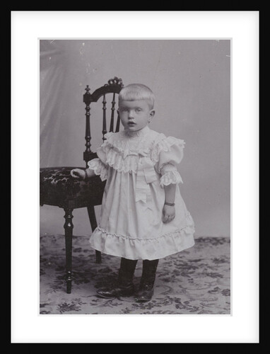 Studio Portrait of a baby in a chair by J.L.T. Huijsen