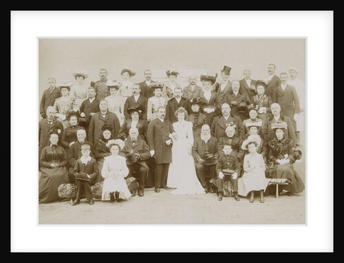 Group portrait of wedding couple by E. Coquet