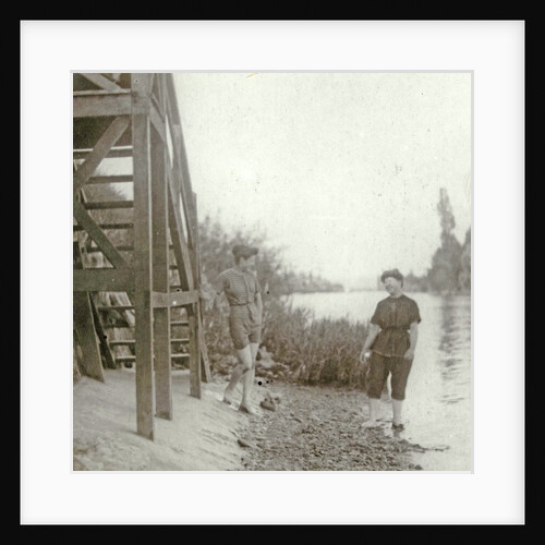 Two women at a stairway on the bank of a river or lake by Anonymous