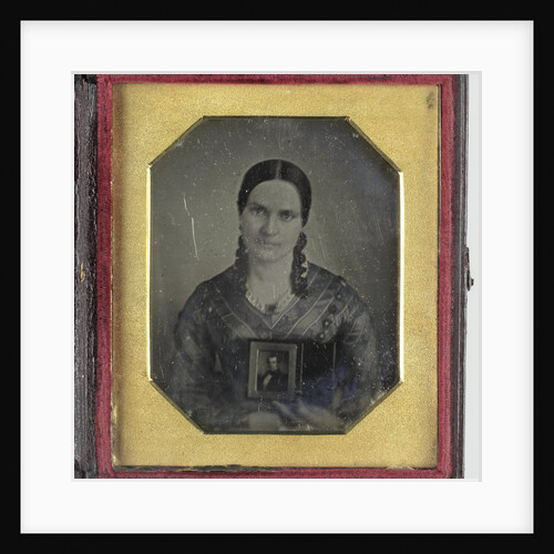 Portrait of a Young Woman with a Daguerreotype by Mathew B. Brady
