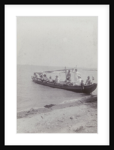 Group men in a boat on the beach in the Dutch East Indies, indonesia by Anonymous