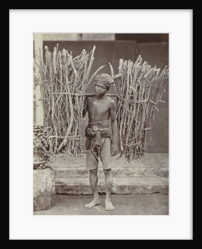 Portrait of a Java, Indonesianese man with collected wood, Indonesia by Anonymous