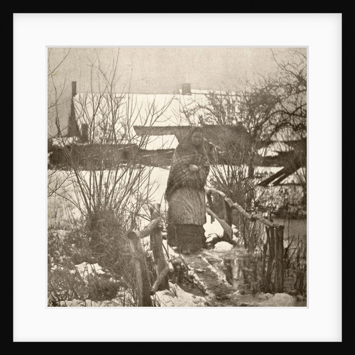 Woman on a bridge in a winter landscape by Peter Henry Emerson