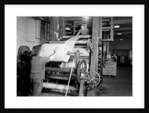 Mt. Holyoke, Massachusetts - Paper. American Writing Paper Co. Super-calender - putting on roll, starting operation, 1936 by Lewis Hine