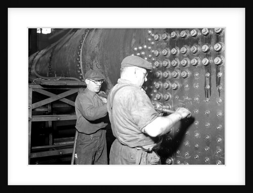 Eddystone, Pennsylvania - Railroad parts. Boilermaker and helper working on locomotive boiler, 1936 by Lewis Hine