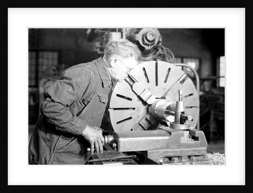 Eddystone, Pennsylvania - Railroad parts. Tool-builder planing for a taper shoe on a steam hammer ram, March 1937 by Lewis Hine