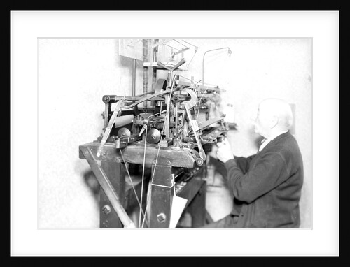 Philadelphia, Pennsylvania - Hosiery. Minnesac Mills. Man working at machine., May 1937 by Lewis Hine