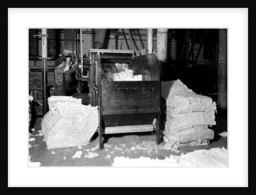 Manchester, New Hampshire - Textiles. Pacific Mills. Opener picker. by Lewis Hine