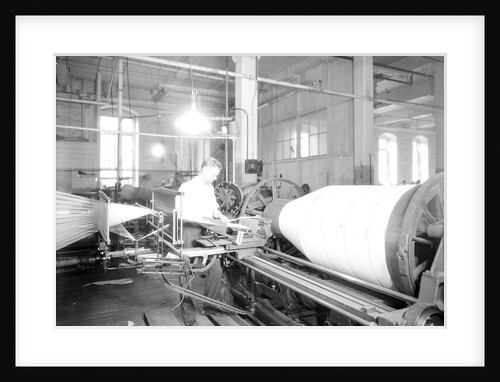 Paterson, New Jersey - Textiles. Jackson Winding and Warping Company - Picture of a high speed warper, June 1937 by Lewis Hine