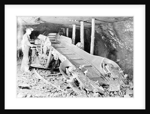 Man operating mining equipment, 1936 by Lewis Hine