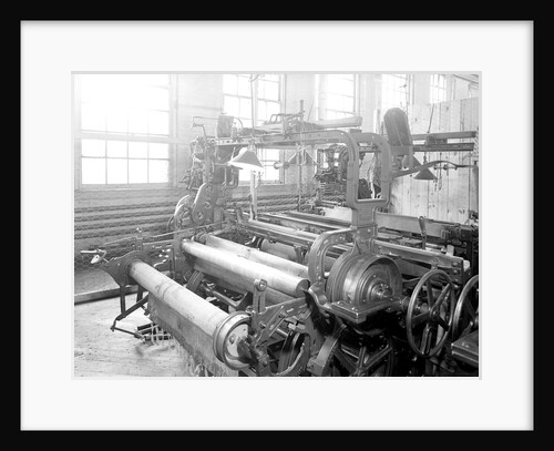 Paterson, New Jersey - Textiles. Idle quilling machines and looms in a cockroach shop. Note partition on the right and chicken-wire in the front, March 1937 by Lewis Hine