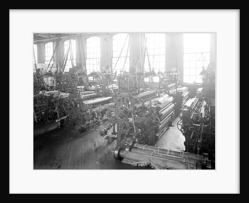 Paterson, New Jersey - Textiles. Idle looms in a cockroach shop. Note the empty beams in the foreground, March 1937 by Lewis Hine