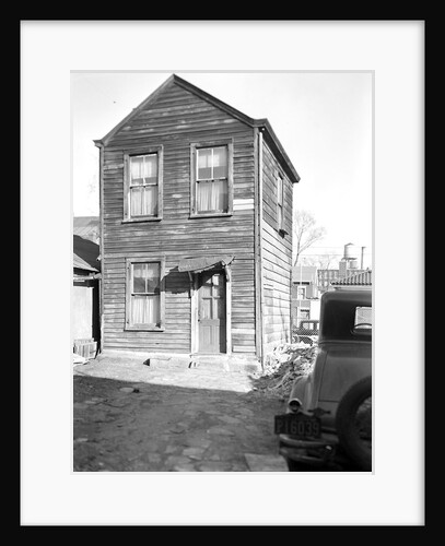 Paterson, New Jersey - Textiles. Two-room home, (kitchen below, bedroom above) of an old retired silk-worker by Lewis Hine