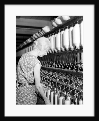 Millville, New Jersey - Textiles. Millville Manufacturing Co. Lady twisting thread, 1936 by Lewis Hine