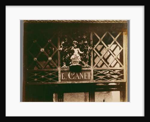Au Petit Bacchus, rue St. Louis en l'Ile, 61 (Shop Sign, rue St. St. Louis en l'Ile) by Eugène Atget