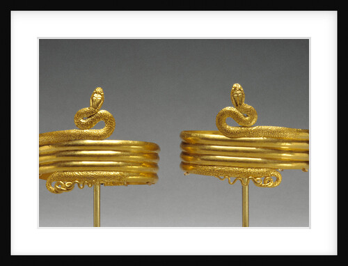 Pair of upper arm bracelets in the form of a coiled snake by Anonymous
