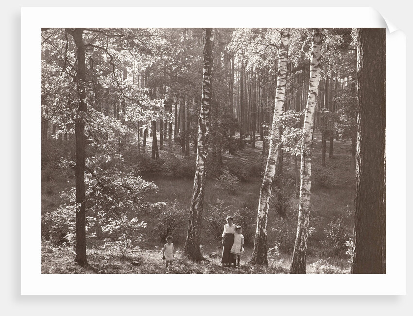Olga Marba and Eckart Titzenthaler, wife and children of the photographer, standing in a forest by Waldemar Titzenthaler