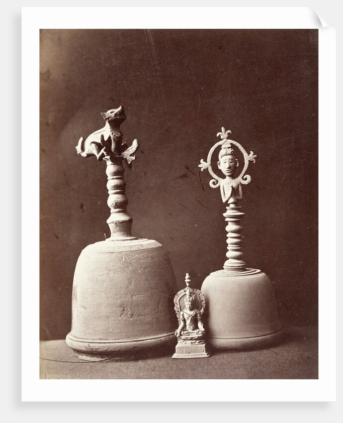 Two bronze handbells and a statuette of bodhisattva Padmapani by Isidore van Kinsbergen