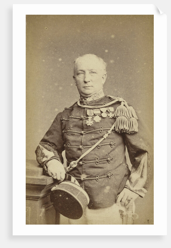 Studio Portrait of a man in military uniform by Woodbury & Page