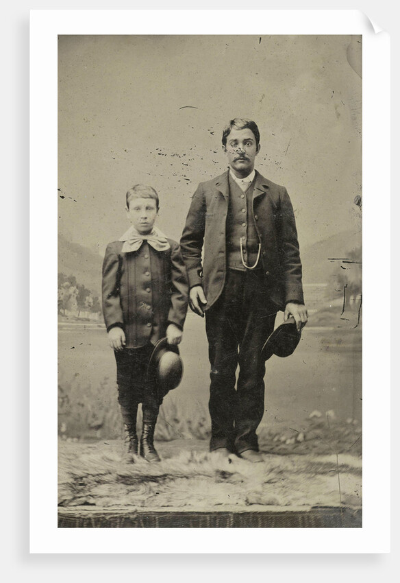 Portrait of a man and a boy, standing in front of a painted backdrop by Anonymous