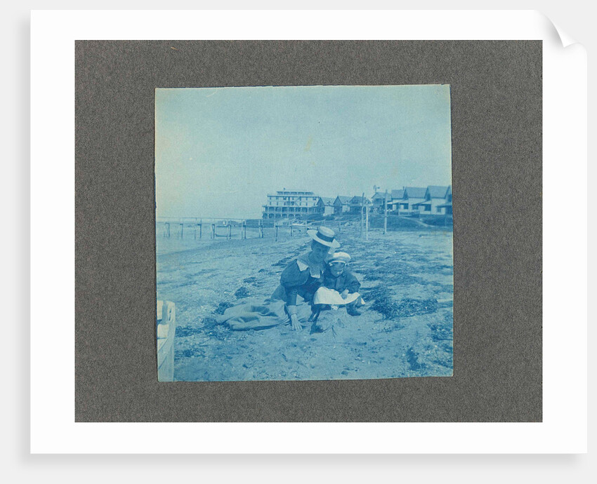 Woman with a child on the beach, USA by Anonymous