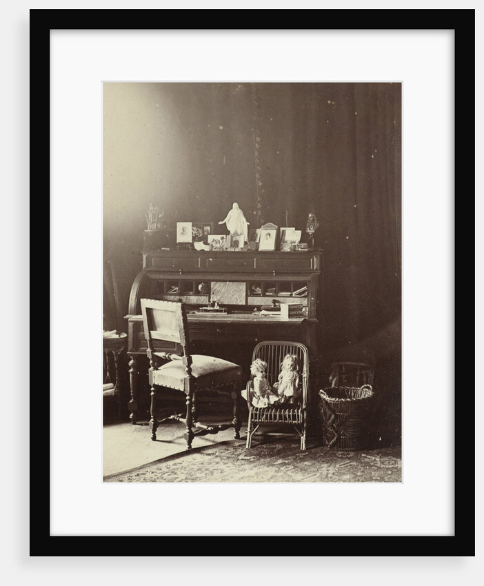 A room with writing table in mansion in Utrecht The Netherlands, on the desk are pictures and statues by Henry Pauw van Wieldrecht