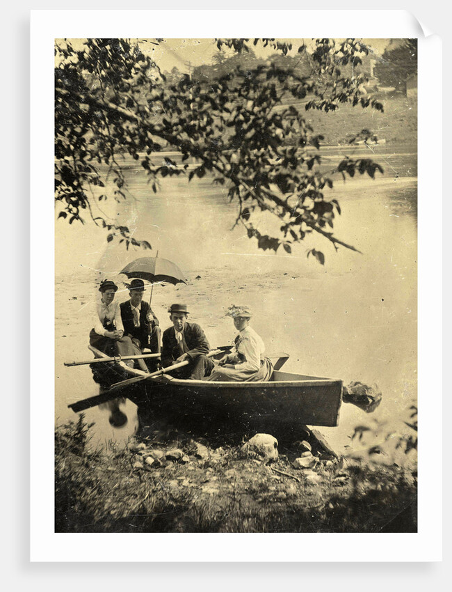 Two men and two women in a rowboat on a lake by Anonymous