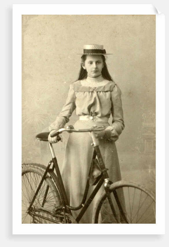 Portrait of young woman in dress with ladies bike by Alex van Dijck