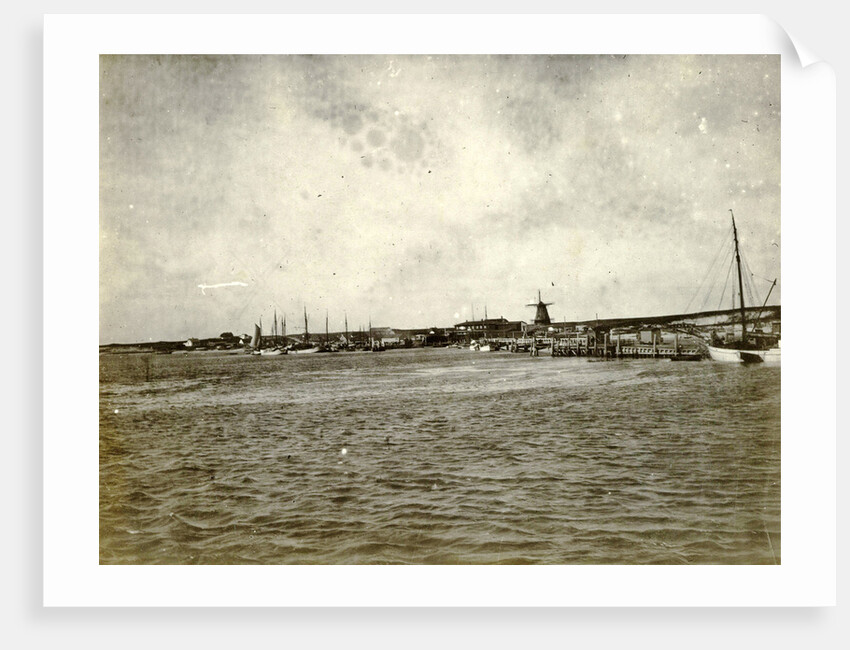 Sight over a river (?), The Netherlands, with a bridge and a mill in the background by Anonymous