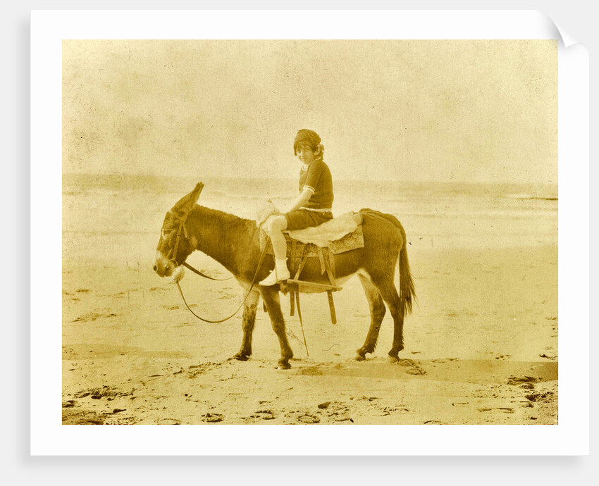 Girl on donkey on the beach North Sea, the Netherlands or Germany by Anonymous