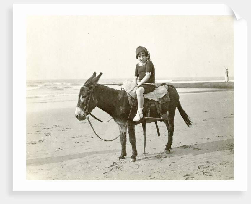 Girl on donkey on the beach (North Sea), the Netherlands or Germany by Anonymous