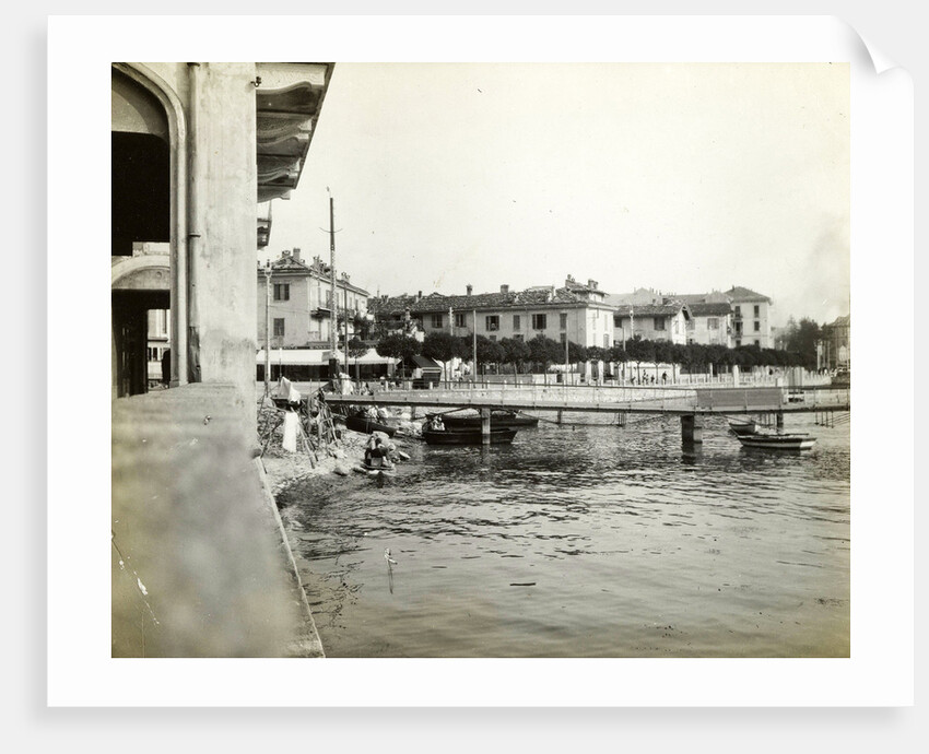 City on the coast, with a pier, possibly in Italy by Anonymous
